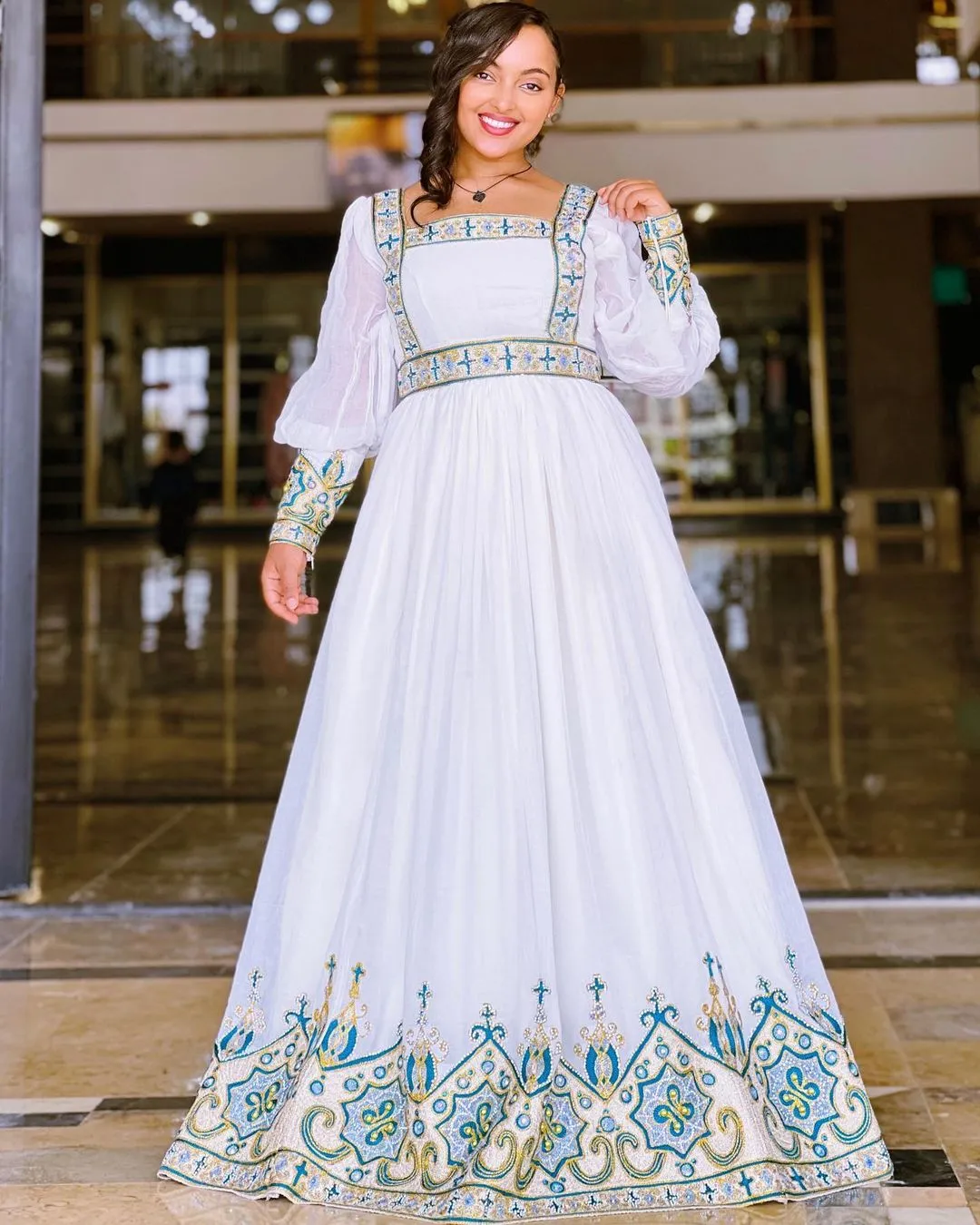 Elegant Modern Light Blue Habesha Kemis A Fresh Twist on Ethiopian Traditional Dress